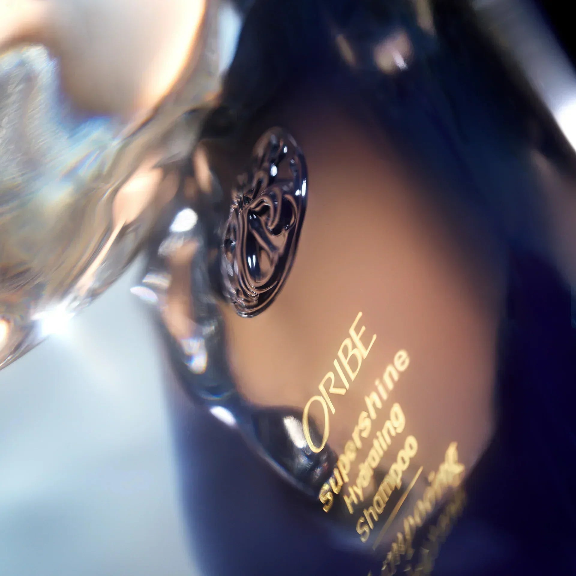 Oribe Supershine Hydrating Shampoo bottle close-up