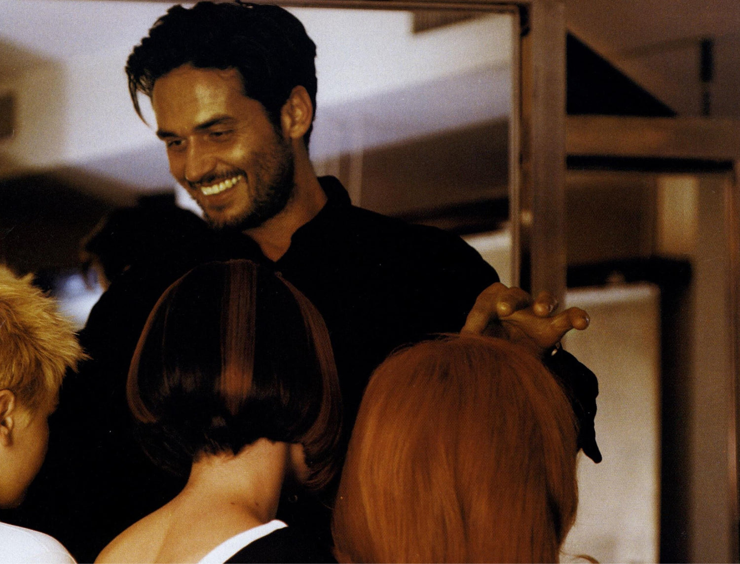 Hairstylist with female customers