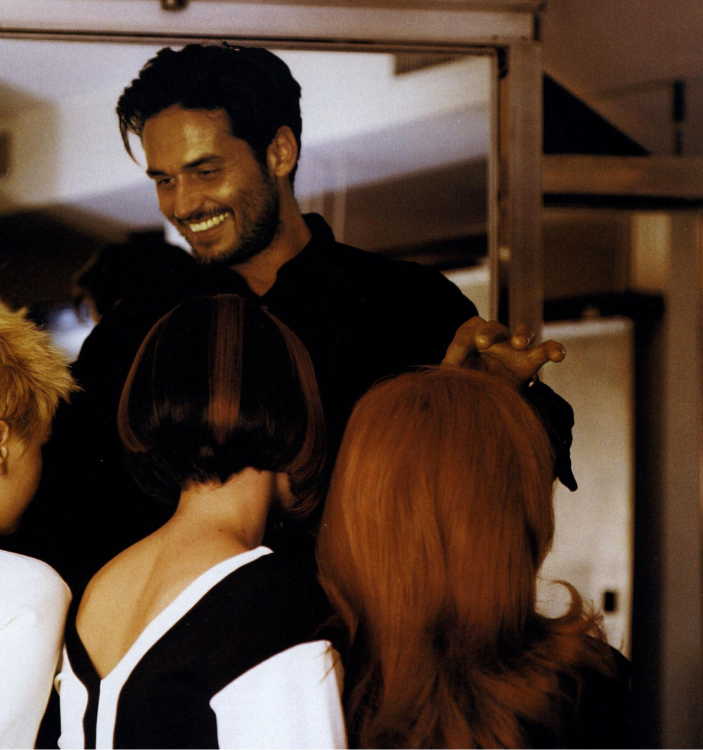 Hairstylist with female customers